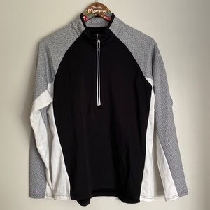 Antiqua women’s athletic top/jacket black and white size large long sleeve.